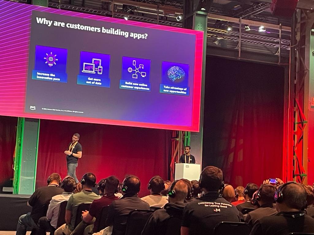 Emanuel presenting about customer app development at AWS Summit
